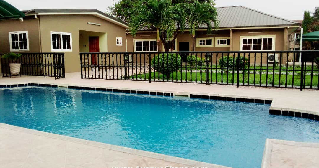 Furnished 5 bedroom house with swimming pool & 2 bed outhouse to let at Achimota, Accra